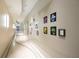 Hallway with unique artwork on the walls at 150 E Robinson St # 3106, Orlando, FL 32801