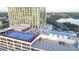 Aerial view showing building amenities, including a pool and basketball court at 150 E Robinson St # 3106, Orlando, FL 32801