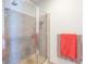 Bathroom with shower and tile surround at 150 E Robinson St # 3106, Orlando, FL 32801