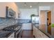 Modern kitchen with stainless steel appliances at 150 E Robinson St # 3106, Orlando, FL 32801