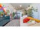 Living room with city views and stylish decor at 150 E Robinson St # 3106, Orlando, FL 32801