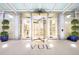 Modern building entrance with revolving doors at 150 E Robinson St # 3106, Orlando, FL 32801