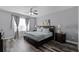 Relaxing main bedroom with a king-size bed, nightstands, and ample closet space at 3356 Robert Trent Jones Dr # 101, Orlando, FL 32835