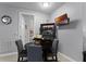 Cozy breakfast nook with a small table and four chairs, perfect for morning meals at 3356 Robert Trent Jones Dr # 101, Orlando, FL 32835