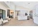 Modern kitchen with white cabinetry, stainless steel appliances, and wine storage at 4024 W Danby Ct, Winter Springs, FL 32708