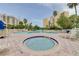 Relaxing pool and hot tub area with lounge chairs at 6165 Carrier Dr # 2602, Orlando, FL 32819