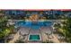 Aerial view of resort-style pool and spa at 7740 Sandy Ridge Dr # 121, Reunion, FL 34747