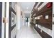 Bright entryway with wood-look wall and tiled floor at 9043 Sunshine Ridge Loop, Kissimmee, FL 34747