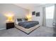 King size bedroom with tufted headboard and nightstands at 9043 Sunshine Ridge Loop, Kissimmee, FL 34747