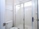 Small bathroom with shower and toilet at 9043 Sunshine Ridge Loop, Kissimmee, FL 34747