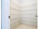 Walk-in pantry with ample shelving at 9043 Sunshine Ridge Loop, Kissimmee, FL 34747