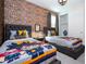 Twin bedroom with Hogwarts theme and closet at 9043 Sunshine Ridge Loop, Kissimmee, FL 34747