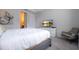 Main bedroom with sitting area and large TV at 9043 Sunshine Ridge Loop, Kissimmee, FL 34747