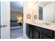 Double vanity bathroom with a view of bedroom at 9043 Sunshine Ridge Loop, Kissimmee, FL 34747