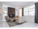 Cozy sitting area with fireplace and comfortable armchairs at 9043 Sunshine Ridge Loop, Kissimmee, FL 34747