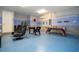 Game room with foosball, air hockey, and seating at 9043 Sunshine Ridge Loop, Kissimmee, FL 34747
