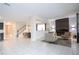 Open floor plan with modern fireplace and seating area at 9043 Sunshine Ridge Loop, Kissimmee, FL 34747