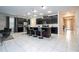 Open concept kitchen with island and breakfast bar at 9043 Sunshine Ridge Loop, Kissimmee, FL 34747