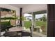 Bright dining area with sliding doors leading to backyard at 5736 Le Marin Way, Kissimmee, FL 34758