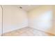 Spacious bedroom with neutral walls and tile flooring at 1910 Lakeview Ln, Poinciana, FL 34759