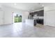 Open concept kitchen with island and access to backyard at 1910 Lakeview Ln, Poinciana, FL 34759