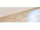 Beige tile floor at 1910 Lakeview Ln, Poinciana, FL 34759