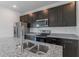 Modern kitchen with stainless steel appliances at 1910 Lakeview Ln, Poinciana, FL 34759