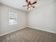 Well-lit bedroom with carpeted floors and ample space at 6311 Alamanda Hills Dr, Lakeland, FL 33813