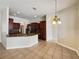 Spacious kitchen with island and stainless steel appliances at 6311 Alamanda Hills Dr, Lakeland, FL 33813
