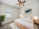 Relaxing main bedroom with a king-size bed, and modern decor at 6311 Alamanda Hills Dr, Lakeland, FL 33813