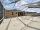Spacious screened patio with concrete floor, perfect for outdoor relaxation at 6311 Alamanda Hills Dr, Lakeland, FL 33813