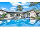 Inviting pool area with blue water and spacious patio at 734 Riverbend Blvd, Longwood, FL 32779