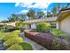 House exterior showcasing a well-maintained lawn and landscaping at 734 Riverbend Blvd, Longwood, FL 32779