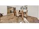 Casual dining area with wood table and wicker chairs at 734 Riverbend Blvd, Longwood, FL 32779