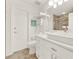 Clean bathroom with white vanity, toilet and shower at 734 Riverbend Blvd, Longwood, FL 32779