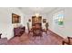 Classic dining room with a wooden table, chairs, and a chandelier at 734 Riverbend Blvd, Longwood, FL 32779