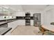 Modern kitchen featuring stainless steel appliances and ample counter space at 734 Riverbend Blvd, Longwood, FL 32779