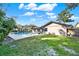 Aerial view showing the house, pool, and spacious backyard at 734 Riverbend Blvd, Longwood, FL 32779