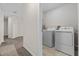 Convenient laundry room with washer and dryer at 1092 Downswing Pl, Davenport, FL 33896