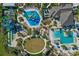Resort-style pool with water slides and a clubhouse at 1092 Downswing Pl, Davenport, FL 33896