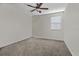 Bright and airy bedroom with neutral colored carpet at 1092 Downswing Pl, Davenport, FL 33896