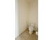 Small bathroom with toilet and tile floor at 3995 Scarlet Branch Rd, Orlando, FL 32824