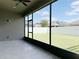 Screened patio with backyard view at 3995 Scarlet Branch Rd, Orlando, FL 32824