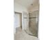 Bathroom with shower stall and tiled floors at 3995 Scarlet Branch Rd, Orlando, FL 32824