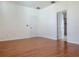 Bedroom with hardwood floors and an ensuite bathroom at 3995 Scarlet Branch Rd, Orlando, FL 32824