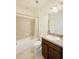 Simple bathroom with shower/tub combo and vanity at 3995 Scarlet Branch Rd, Orlando, FL 32824