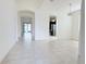 Bright, spacious living room with tile floors and open floor plan at 3995 Scarlet Branch Rd, Orlando, FL 32824