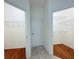Hallway with access to multiple closets at 3995 Scarlet Branch Rd, Orlando, FL 32824