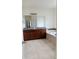 Bathroom with double vanity, large mirror, and garden tub at 3995 Scarlet Branch Rd, Orlando, FL 32824