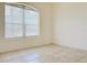Bright bedroom with tile floors and ceiling fan at 3995 Scarlet Branch Rd, Orlando, FL 32824